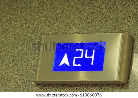 The number tells the 24th floor of the elevator in under ligthing.