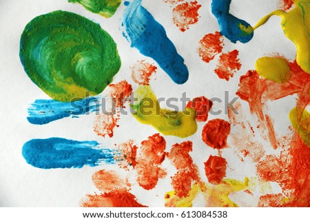children drawing finger paints