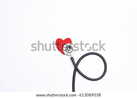 A stethoscope and a love sign over white background