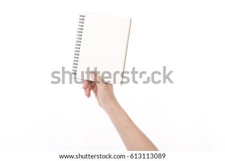woman's hand showing blank book