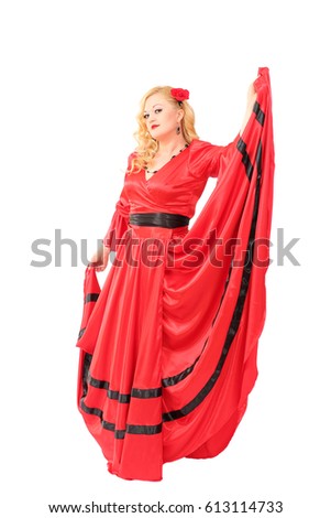 Beautiful gipsy lady in red dress dancing
