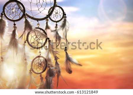 Dreamcatcher at sunset with copy space Royalty-Free Stock Photo #613121849