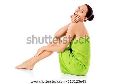 Young beautiful woman after bath full portrait isolated over white.