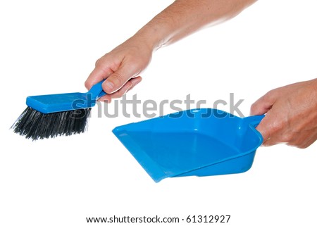 Hands with dustpan and brush isolated on white.