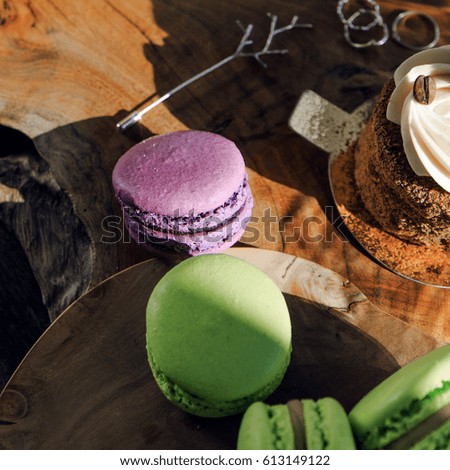 French sweets and coffee in the wood table