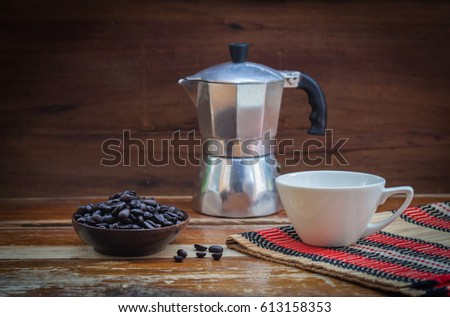 still life coffee bean and cup on wood
