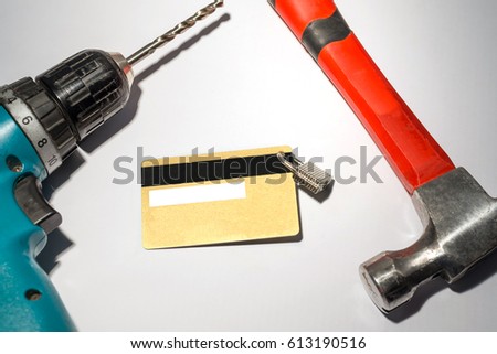 Credit card with hanging padlock drill and hummer