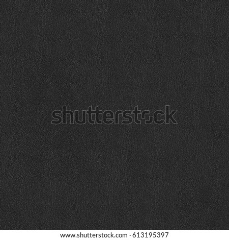 Black scratched leather to use as background. Seamless square texture, tile ready. High resolution photo.