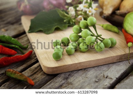 turkey berry on wooden table. V