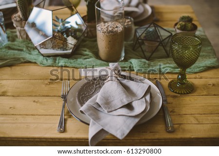 Rustic serving with wood and plant decor