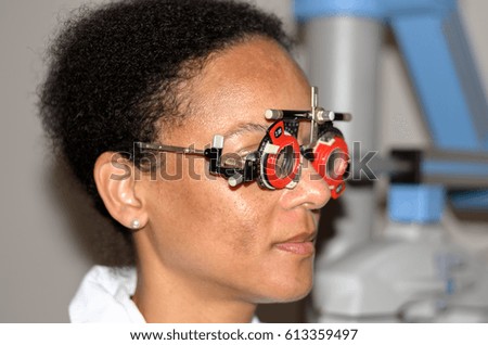 Young African woman at an eye test in a hospital