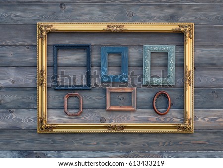 Baroque, gold, old, victorian, empty collection of frames on a wooden wall