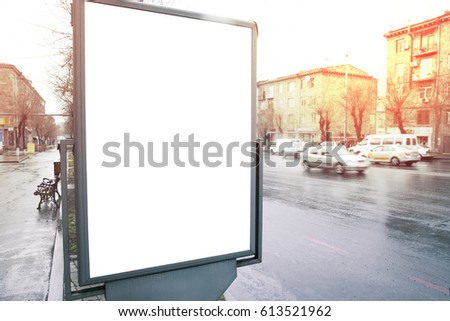 
 Blank billboard on the bus station with urban scene