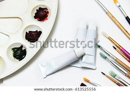 Paint brush or brush of art. Model of tubes for paints. Tubes for oil paints mock up.