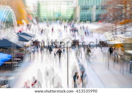 London, Canary Wharf. Walking people blurred image