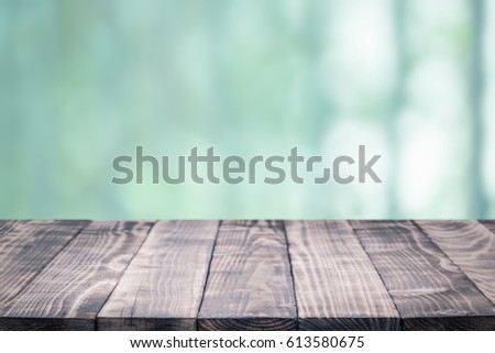 Old wood coordination table top on nature background,Space available for the product
