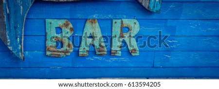 wooden bar sign