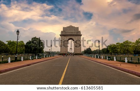 India Gate a war memorial built on the eastern end of Rajpath road New Delhi at sunset time. Royalty-Free Stock Photo #613605581