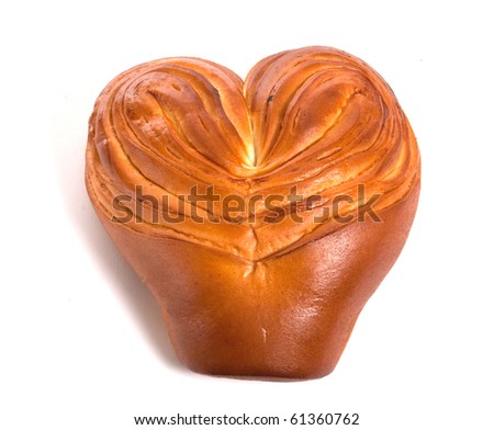 bun with shape of heart isolated on white