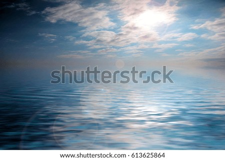The surface of a calm sea with a small ripple under a sunny cloudy sky