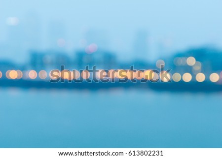 Abstract night lights center image across River Thames, London UK