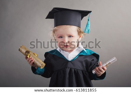 photo of diploma graduating little student kid