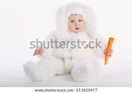 photo of cute baby with rabbit costume