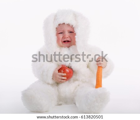 photo of cute baby with rabbit costume