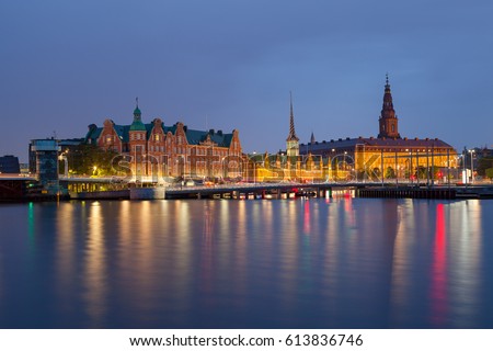 Night view on Christiansborg Palace and Slotsholmen over the canal in Copenhagen, Denmark.