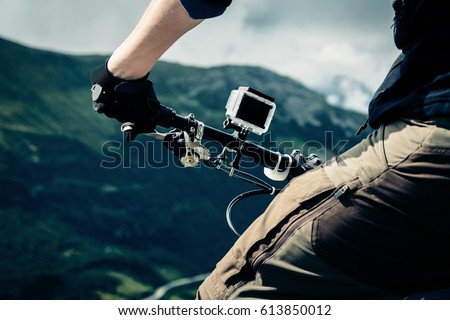 Action Camera Mounted On Mountain Bike Royalty-Free Stock Photo #613850012