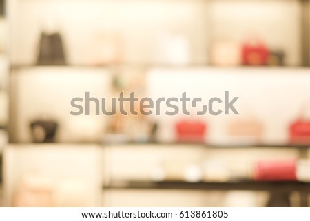Abstract blurred luxury bag in store shop:blurry concept.
