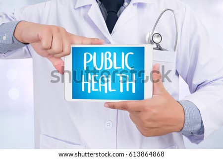 PUBLIC HEALTH  Professional doctor use computer and medical equipment all around, desktop top view