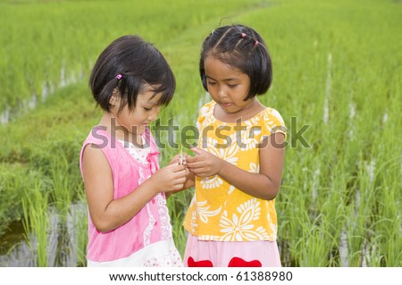 asian girls with grasshopper