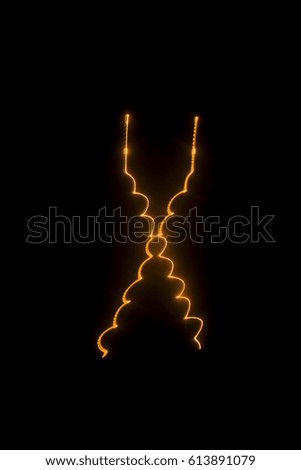 Laser beam orange on a black background 