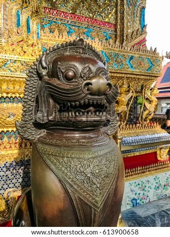 Wat Phra Kaew, Temple of the Emerald Buddha Wat Phra Kaew is one of Bangkok's most famous tourist sites , have symbol a giant and Garuda