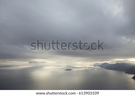Open seascape background with distant mountains