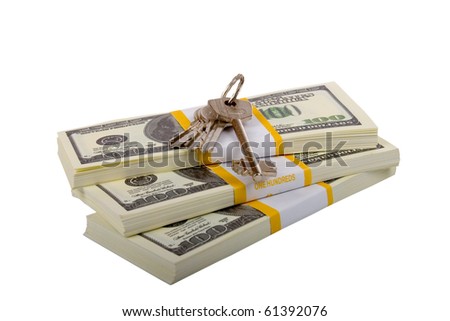 keys to the apartment on packets of dollars  isolated on a white background