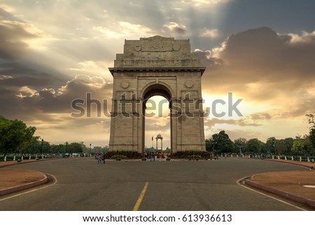 Historic India Gate Delhi - A war memorial on Rajpath road New Delhi at sunrise. Royalty-Free Stock Photo #613936613
