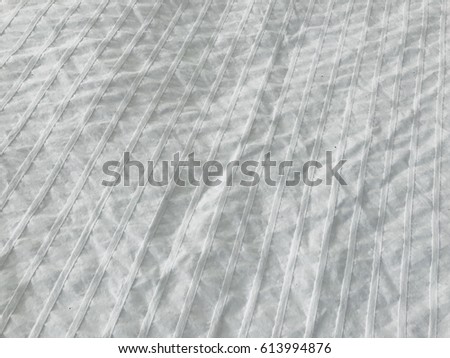 white crumpled textille texture