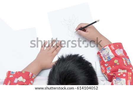 boy drawing cartoon on white paper isolated on white background
