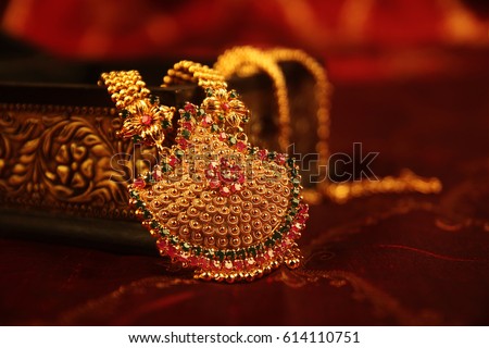      Indian Traditional Gold Necklace  Royalty-Free Stock Photo #614110751
