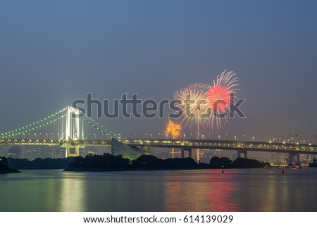 View of Tokyo bay and Tokyo rainbow bridge with beautiful firework