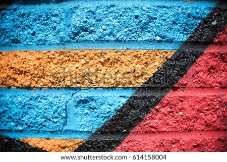 Blue, Orange, Black, Red Brick Wall Background 