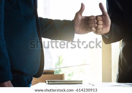 Businessmen with Thumb Up