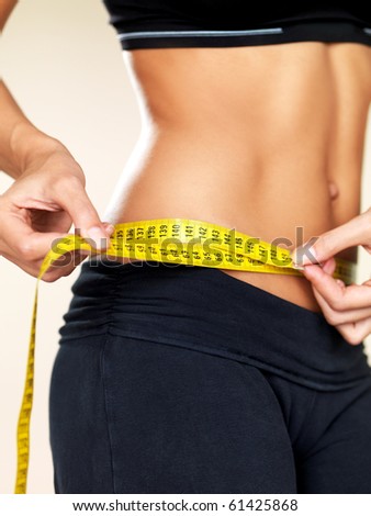 Woman body part is being measured Royalty-Free Stock Photo #61425868