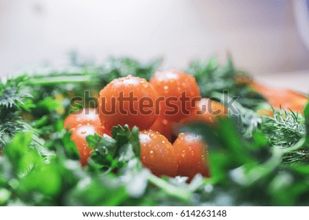 Cherry tomatoes with parsley and dill