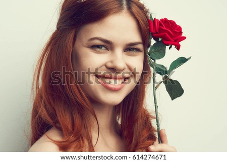 Woman is happy to gift a flower