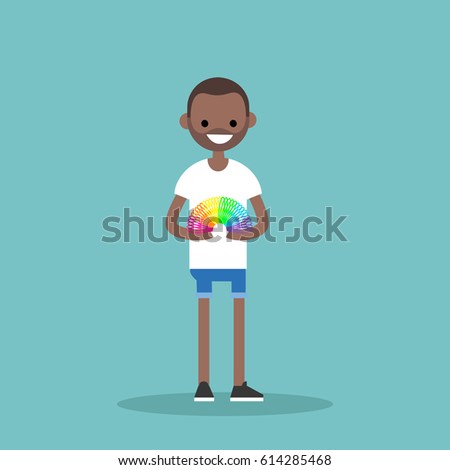 Young black man playing with a spiral rainbow toy / flat editable vector illustration, clip art