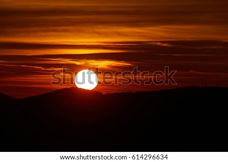 Sunrise over the distant hills