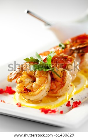 Fried Shrimps on Lemon Carpaccio with Sauce Royalty-Free Stock Photo #61430629